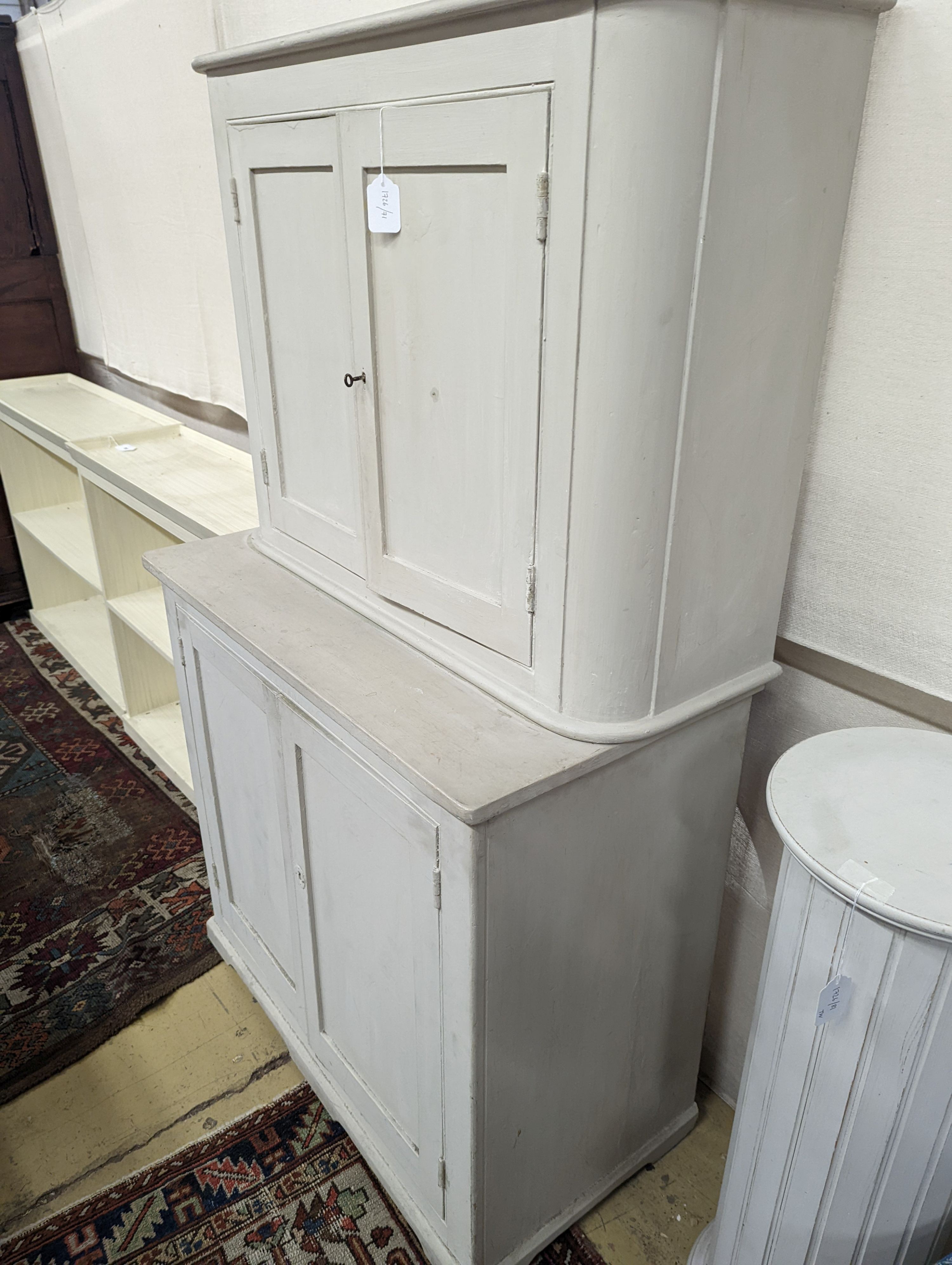 A white painted two section kitchen cupboard of small proportions, width 91cm, depth 47cm, height 154cm